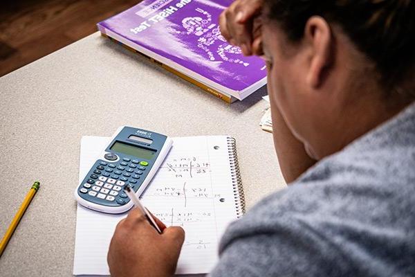 Adult student working on math 